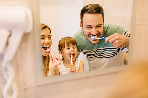 Make Oral Health a Family Affair This Summer